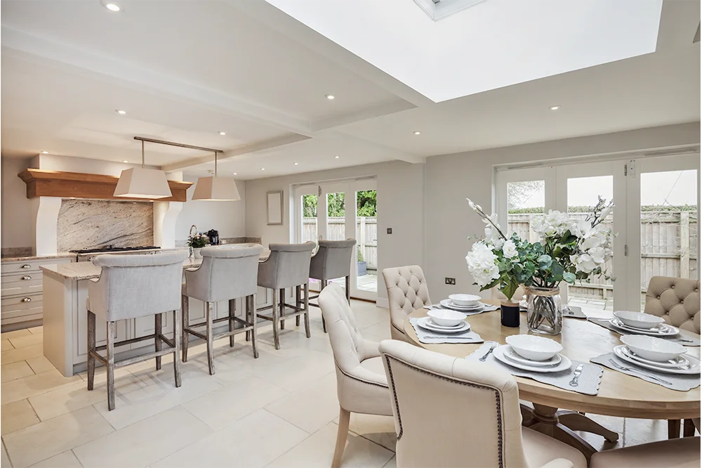 Kitchen-diner with marble island in a Superstrux extension