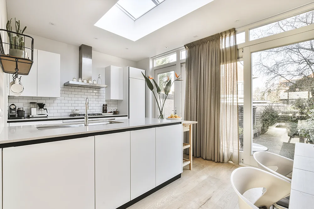 Light-filled kitchen with skylight and garden access