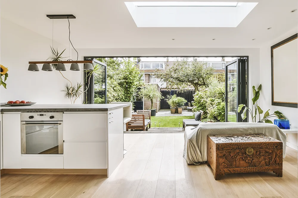 Extension with bi-fold doors fully opened to the garden